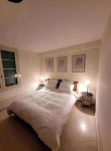 Large apartment in villa with garden and pool