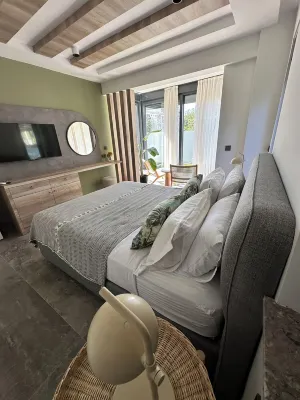 Charming Beachside Apartment with Private Garden Hotels in Kemer Mahallesi