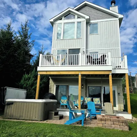 Lake Front Home w/ Hot Tub, Fire pit, yard, walk to Wisp Resort,Tubing Hill View