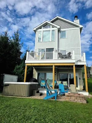 Lake Front Home w/ Hot Tub, Fire pit, yard, walk to Wisp Resort,Tubing Hill View