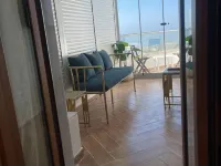 Sheraton ganna inn Hoteles cerca de Playa Mamoura