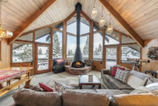 Charming Retreat with Lake Views and Spacious Deck - Inviting Escape