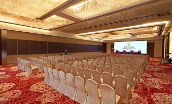 A spacious conference room is arranged with rows of chairs for events or conferences at The Eton Hotel Shanghai