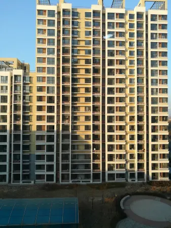 Baiyuan Apartment (Xing'an Street No.1) Отели в г. Цянань