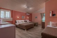 Ouzas Luxury Hotel Hotels near Olympic Beach