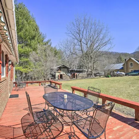 Quaint Creekside Home w/ Spacious Deck & Yard