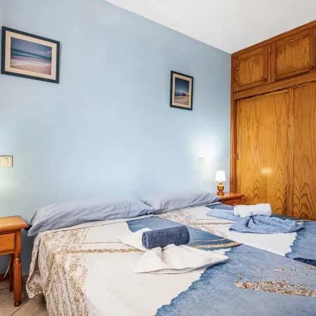 Apartment Near the Beach with a Huge Terrace Patio, Wifi and Parking