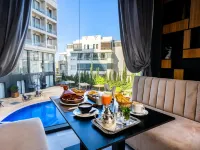 Dominium Hotel Hoteles cerca de Cité Essalam