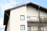 Modern flat facing south with view over mountains and lake