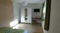 Room with private bathroom in detached house