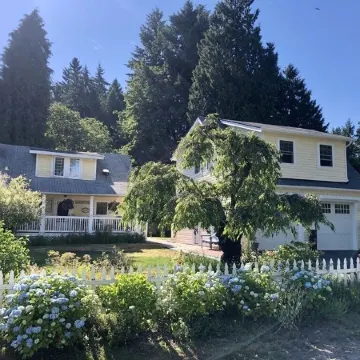 The Suburban Farmhouse" Where Old Meets New.