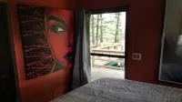 Peaceful Nest / Nirvana Amidst Trees