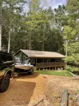 Cozy cabin in the woods.   Close to boat ramp.  Shared 5 bay boat storage
