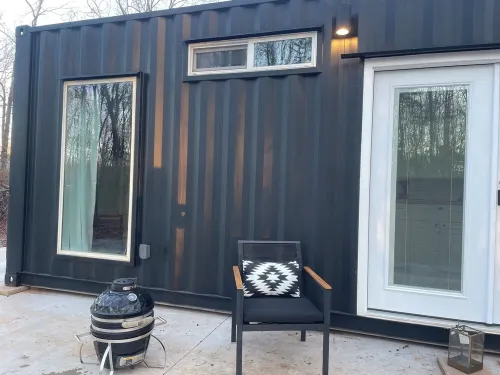 Cozy cabin and contemporary container home on one property! Pets welcome!