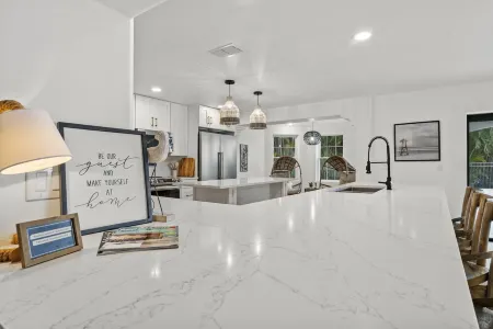 The Sunset Escape: Riverfront Elegance with Pool