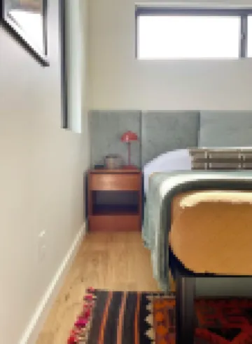 Sunlit loft with fireplace and king bed