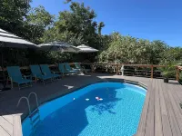 CozyTiki Cottage w/ 2 Private Rooms, Priv Attached Kit/Bath TA-154-746-2656-01 Hotels in Captain Cook