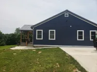 New! Custom built private home on a pond, with large hottub.