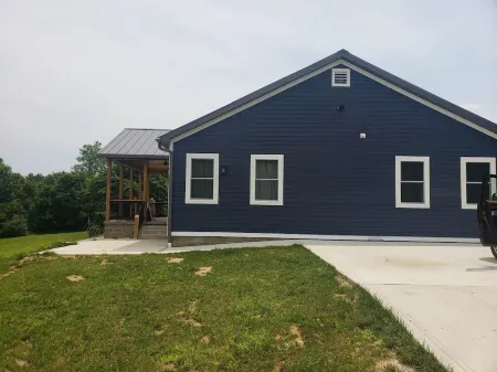 New! Custom built private home on a pond, with large hottub.