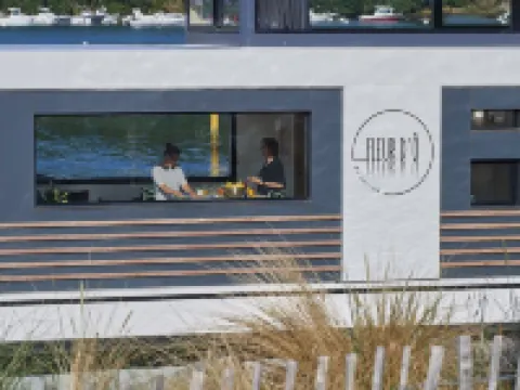 A lodge boat at Guidel-Plages marina Hotels in Guidel