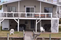 Dog Friendly! Non-Smoking. Cottage w/Dock and Deep Water Access on Natural Canal Hotels in Ocean Isle Beach