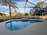 Spacious 4-bedroom pool house with WiFi and AC in charming Vero Beach