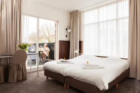 Hotel Stad en Land Отели в г. Алкмар