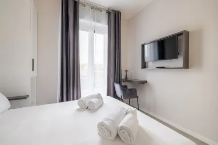 BELLI SAN GIOVANNI GUEST HOUSE Отели рядом с достопримечательностью «Archaeological Area of Santa Croce in Jerusalem»