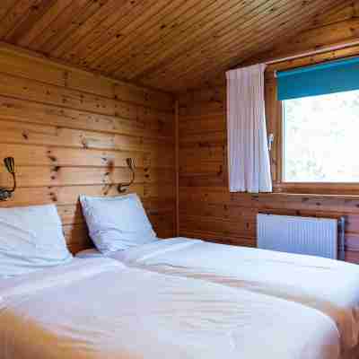 Wooden Bungalow with Dishwasher Near the Beach Rooms