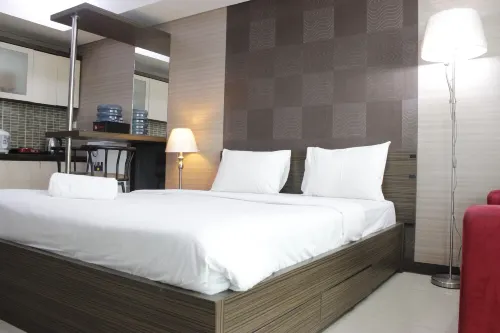 Prime and Comfy Studio at Tamansari la Grande Apartment by Travelio