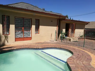 Naisar Holiday Home & Cottage Primrose Hotels near Definitive Conferencing (Pty) Ltd