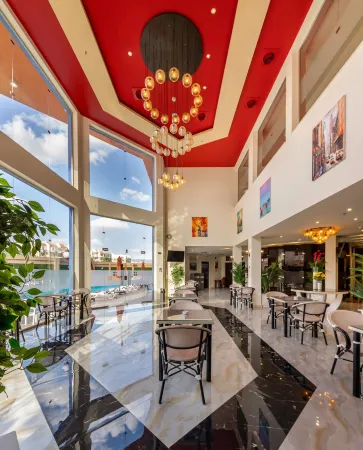 Royal Day Plaza Hotel Отели рядом с достопримечательностью «Миср Юниверсити фор Сайенс & Текнолоджи»