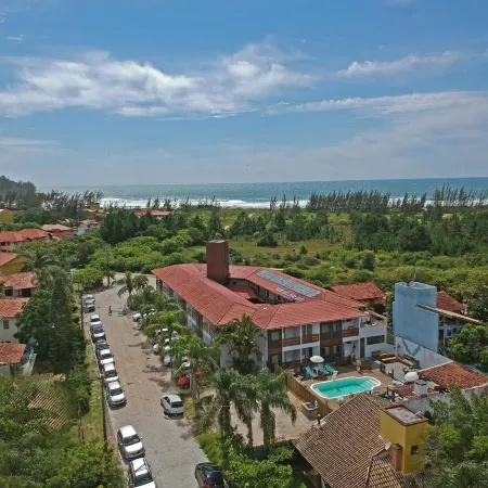 Pousada la Ferrugem Suites