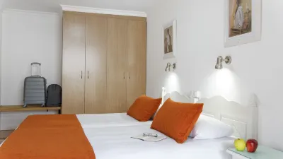 Jacarandas Beach Hotels near Oscar's vape and electronics
