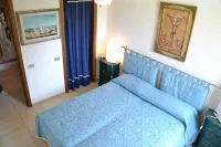 Rena Bianca Cugnana Verde Residence Отели в г. 