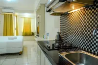 Simply Studio Room at Grand Serpong Apartment by Travelio