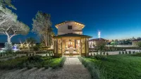 Traldi Resort Hotels near Casa Museo Pietro Moschini