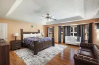 Spacious 6-bedroom Pocono Home with Hot Tub, Game and Theater rooms, Fire Pit!