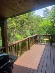 Cozy peaceful cabin with games, massage chair and fire pit! Bring your kayaks!!