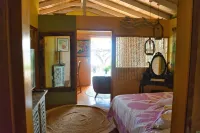 Air-conditioned bungalow by the sea in Moorea Hotels in Te'avaro