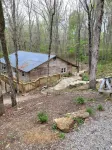 Historic Cabin in a natural setting with waterfalls and covered bridge