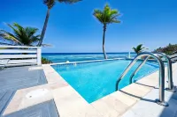 Coral Loft 4BR + 1 BR Oceanfront Villa w/ Private Pool & Beach in Grand Cayman - Beach