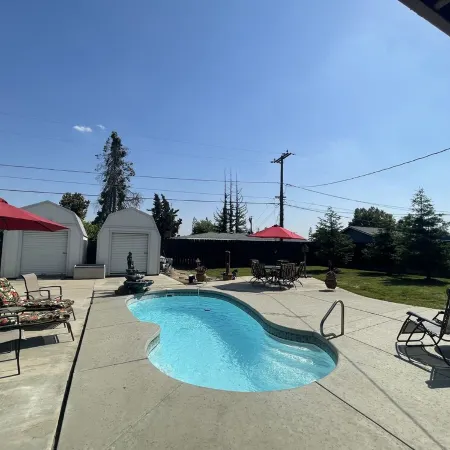 Tulare’s RARE FIND with a pool! Located in the Heart of California’s farmlands!