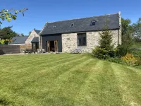 Detached cottage with a large garden in rural woodlands