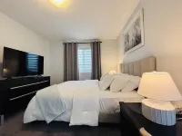 A peaceful cozy three bedroom, home away from home, near Spruce Meadows Hotels near Canadian Tire