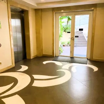 Henry & Adiche  Emperador Building