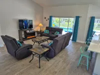 Sadie's Daytona private pool home with 5 king beds , pool table and arcade games