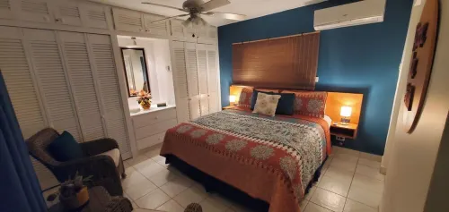 2 mins to beach! Family sized condo with a pool. Super close to dining and fun!