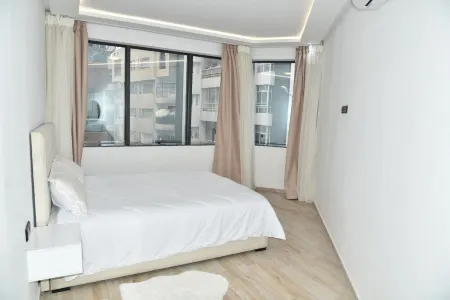 3 Bedroom Apartment With Netflix & Private Parking Отели в г. Кенитра