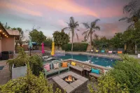 Luxury Oasis w Pool Hot Tub Fire Pit Games Big Yard Larrea by AvantStay